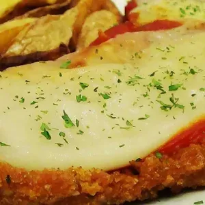 Milanesa de Puerco al Gratín + Postre GRATIS