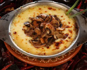 Queso fundido con champiñon