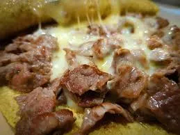 Kilo de costilla con queso